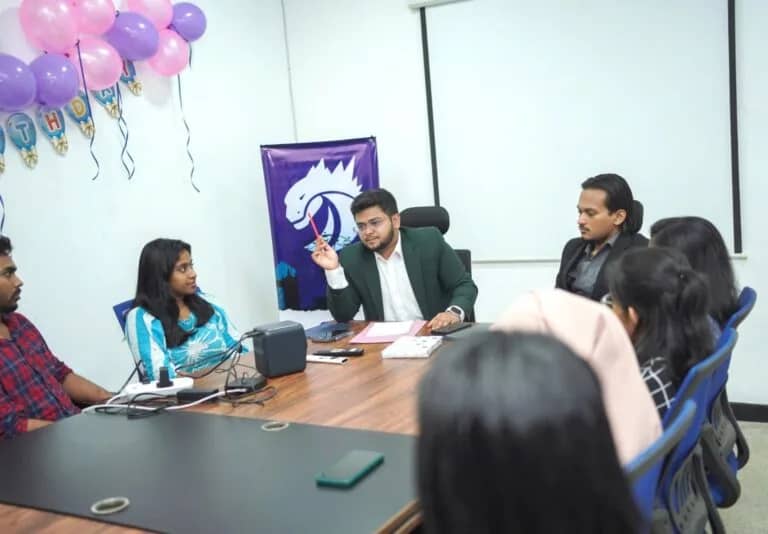 Codezela team collaborating during a strategy meeting